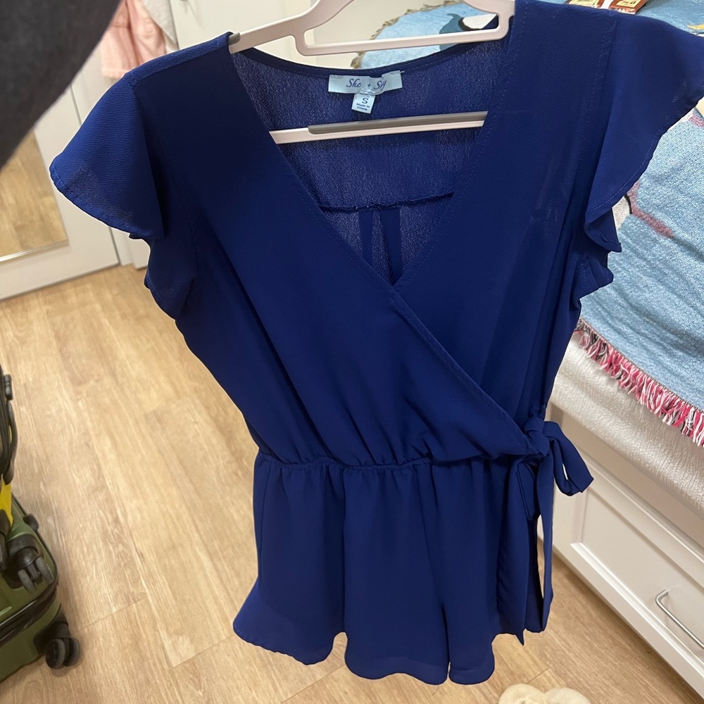 She + sky blue romper